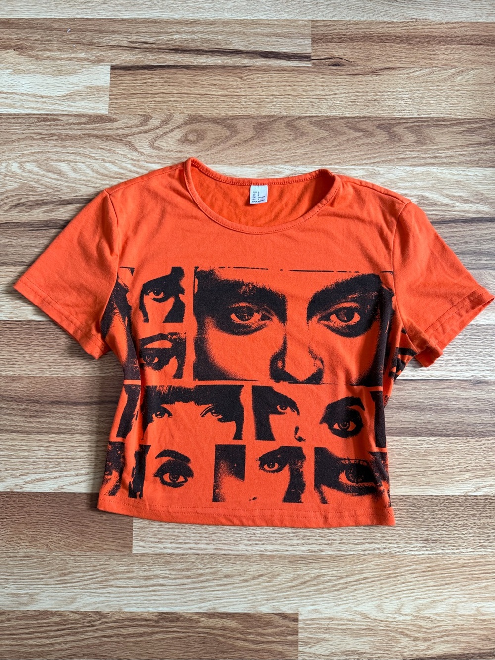 Amazon Orange Graphic Crop Top with Black Face Print